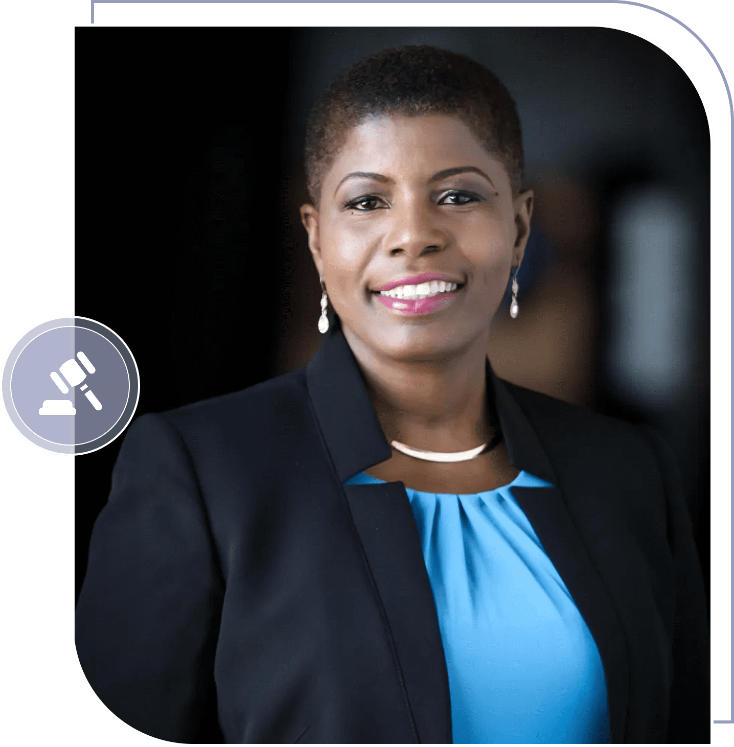 Professional woman in business attire smiling confidently.